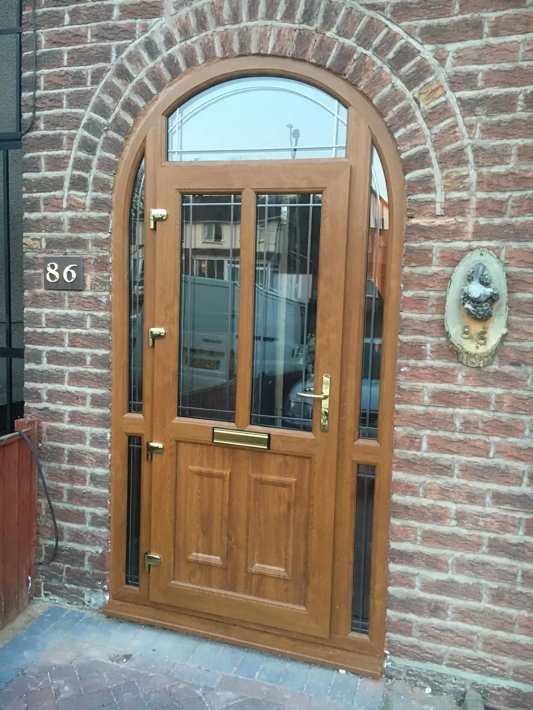 Arched timber-effect door